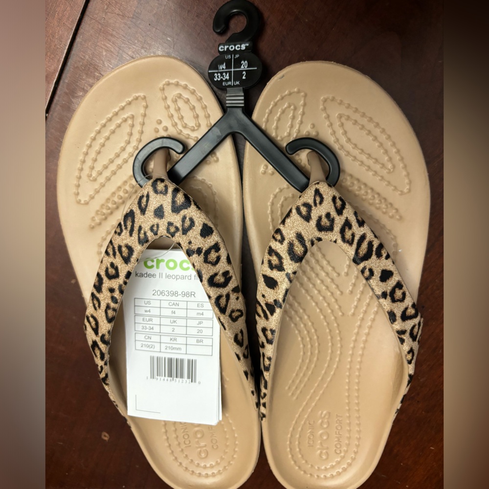 Woman’s kadee 2 leopards flip flop crocs gold/black size 4 brand new‎